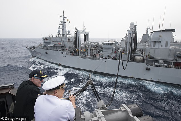 Secretary of the Navy (SECNAV) Ray Mabus (left)