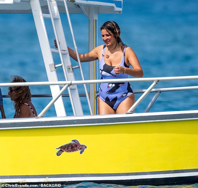 Lliana went into the water for a refreshing dip after topping up her tan