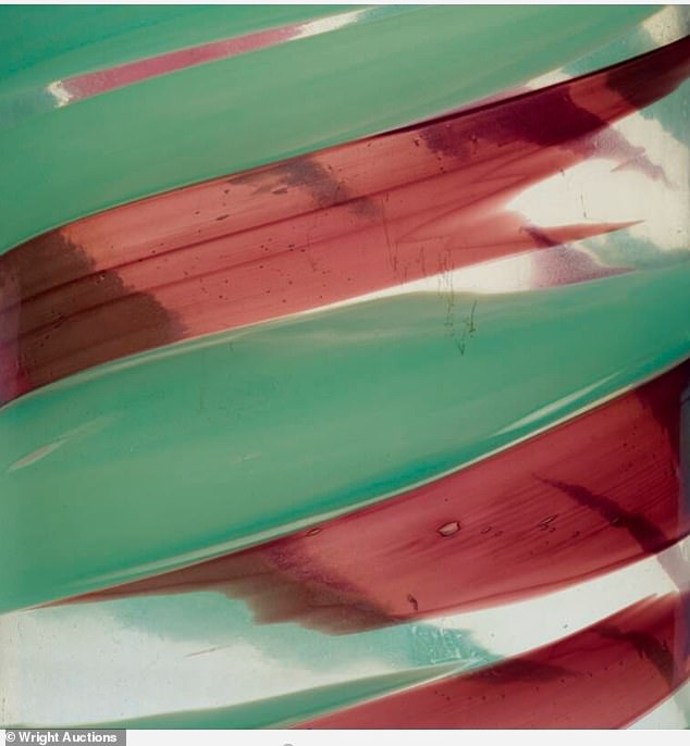 The technique on the vase – Pennellate, which means brushstroke in Italian – was 'accomplished by adding colored opaque glass to the vase as it was blown, and dragging the material around the perimeter of the piece until the desired level of transparency had been achieved'