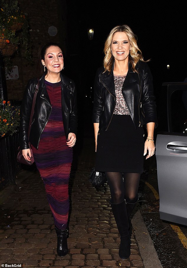 Charlotte Hawkins (right) appeared in good spirits as she arrived at the venue in a glittery animal print top and a black mini skirt