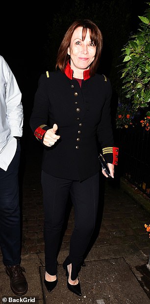 Sky News presenter Kay Burley was all smiles as she arrived at the event wearing a black jacket with a red collar paired with a dark red top