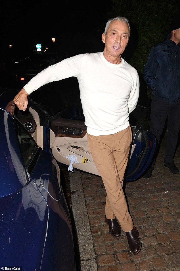 Bruno Tonioli went for a more relaxed look, wearing a white long-sleeved top, khaki pants and dark brown shoes.