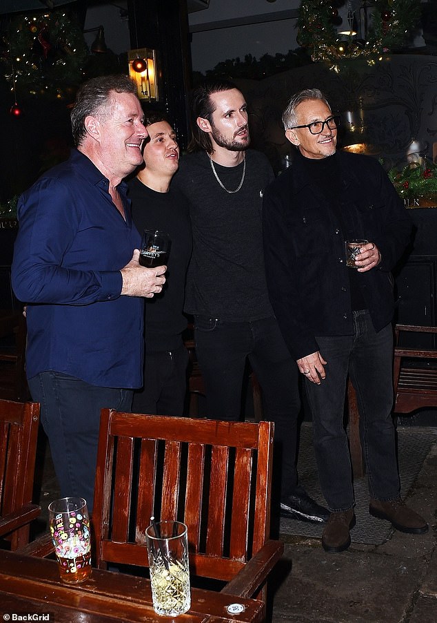 Gary Lineker attended the event with his son George, as the pair posed for a photo with Piers and his son Spencer