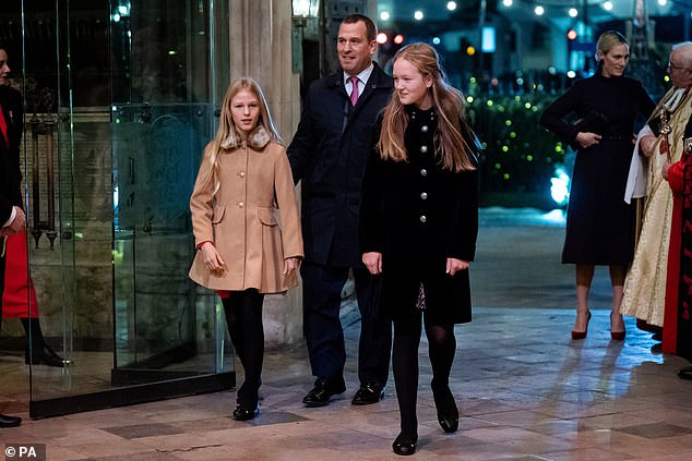 Princess Anne's son Peter Phillips arrives with his daughters Isla and Savannah