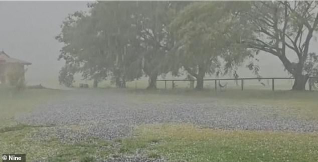 Record-breaking damaging winds, large hail and heavy rain continue to wreak havoc across south-east Queensland