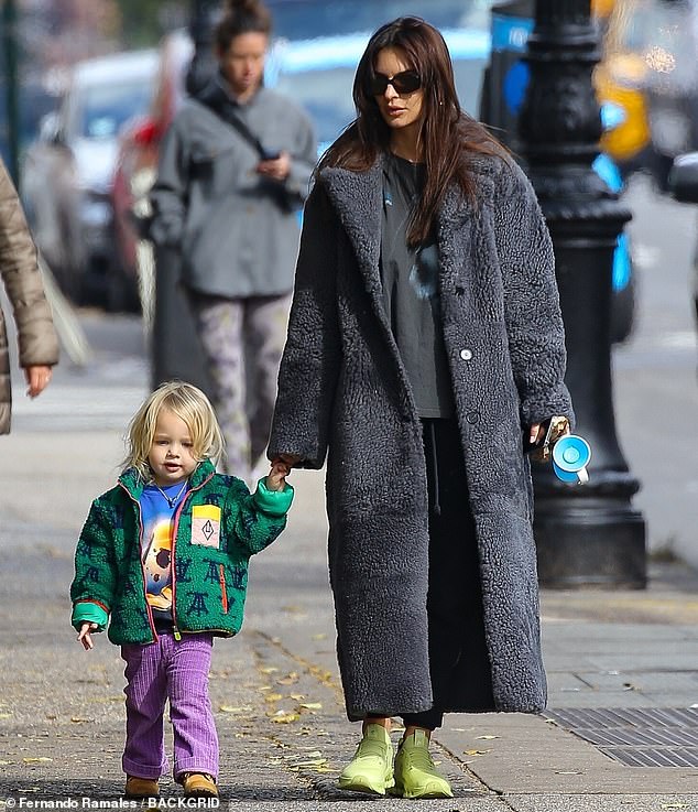 Emily lives in New York with baby Sly and her beloved rescue dog Colombo;  seen in November