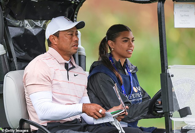 There are rumors that Woods, pictured with daughter Sam, might stop wearing Nike