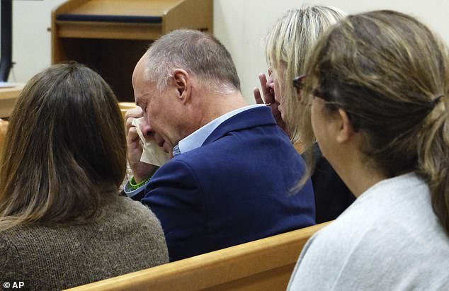 Relatives of the deceased children are seen sobbing during the October 2022 trial