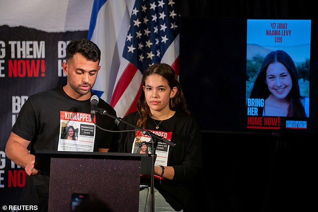 Naama Levy's siblings speak during a Lights for Liberty event demanding the release of the remaining 135 hostages held in Gaza on December 13, 2023