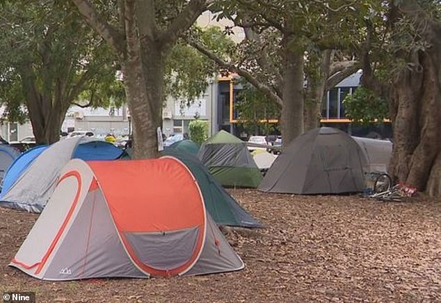 Australians are increasingly flocking to 'tent cities' as the country's housing crisis continues (pictured are tents in Brisbane)