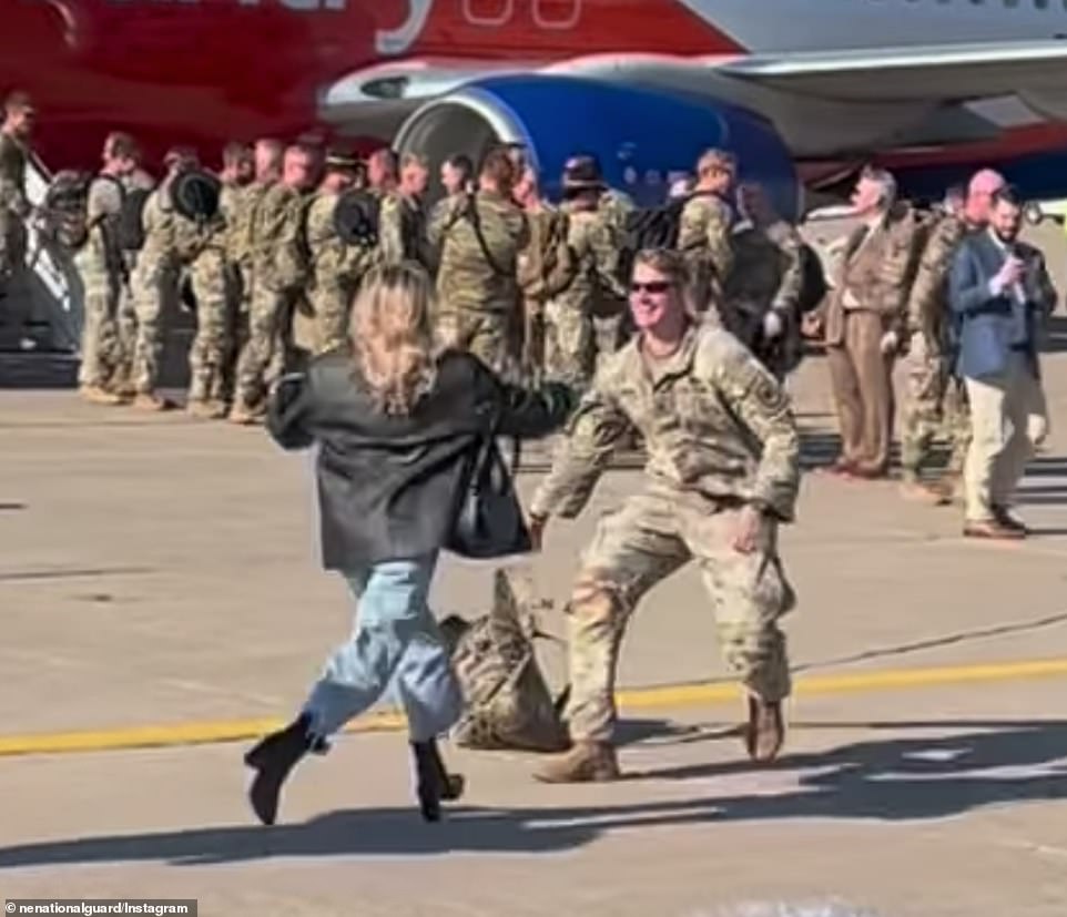 Because the woman who sees her soldier coming out of the plane among the group can wait no longer and races at full speed towards her delighted friend.