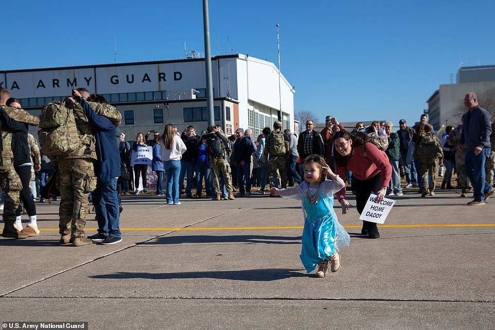 A little girl seemed excited when she saw her father returning from a deployment