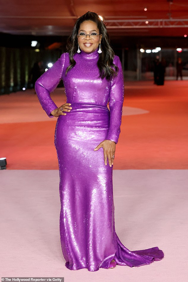 Oprah Winfrey opted for bright purple for her sequined attire at the Academy Museum Gala