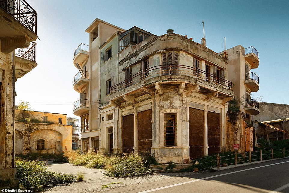 Dimitri wanders the streets of Varosha and photographs the crumbling buildings