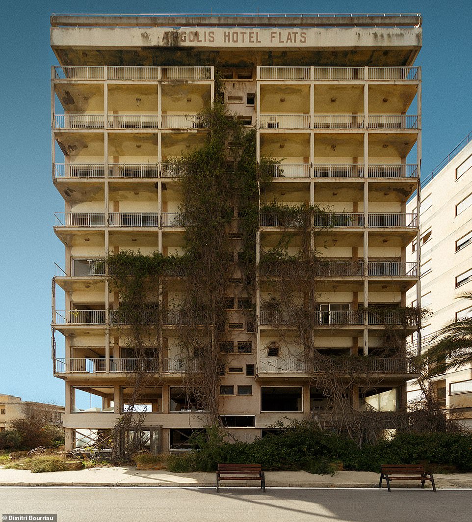 Dimitri captures what strikes him as an 'impressive waterfall of vegetation' in front of the Angolis Hotel Flats, one of many large hotel 'ghosts' in the area