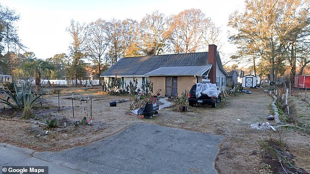 Hartnett and Butler live in a run-down bungalow (pictured) on Corbett Drive, according to police report into their shocking alleged hate crime