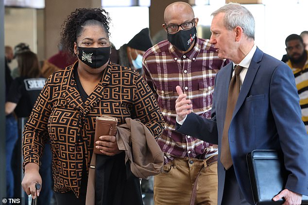 Lynida Williams-Saddler and Vincent Suttles, grandparents of JaQuwaun, with their attorney, Jordan Marsh