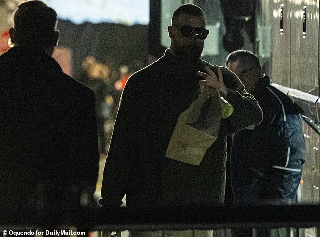 Kelce waved to the cameras as he prepared to leave Gillette Stadium on Sunday night