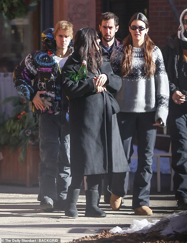 Earlier on Sunday, Justin wore black snow pants and a black jacket with a multi-colored pattern as he enjoyed a day of skiing