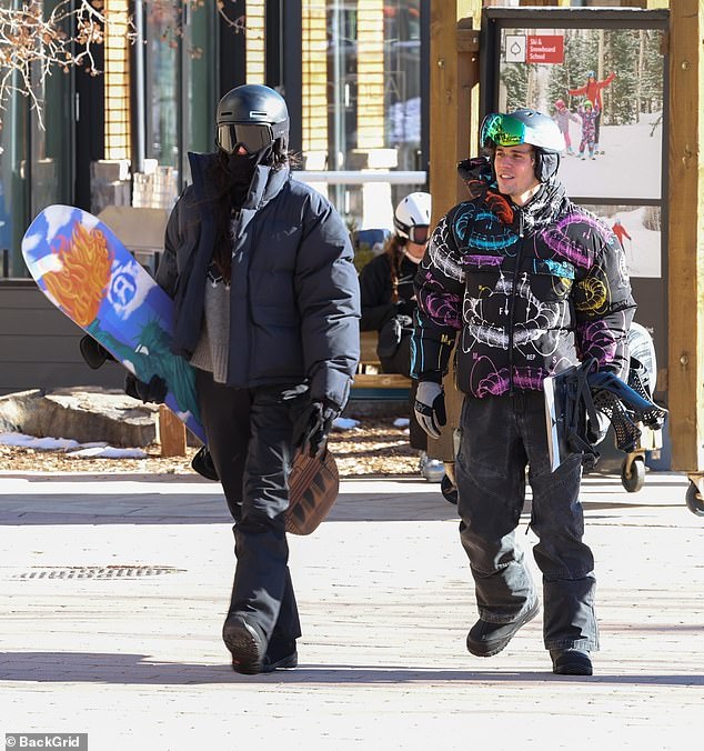 The friends all wore stylish protective equipment: helmets and ski goggles