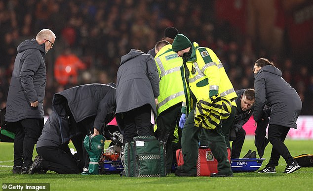 Luton Town's Tom Lockyer receives emergency care after collapsing during the Premier League match between AFC Bournemouth and Luton Town at Vitality Stadium in December