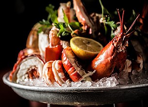 Jane devours warm lobster tails at Smith & Wollensky restaurant (above)