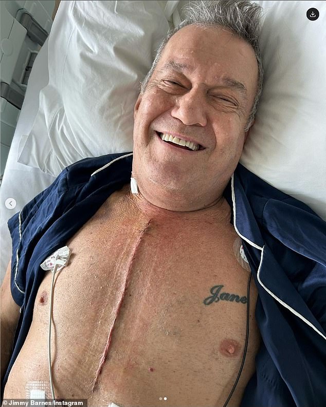 In the image uploaded to Instagram, Jimmy is seen lying on his hospital bed, proudly showing off his chest scar, which stretches the length of his sternum.  The singer looks happy in the frame as he smiles at the camera, with a tattoo of his wife's name visible on the left side of his torso