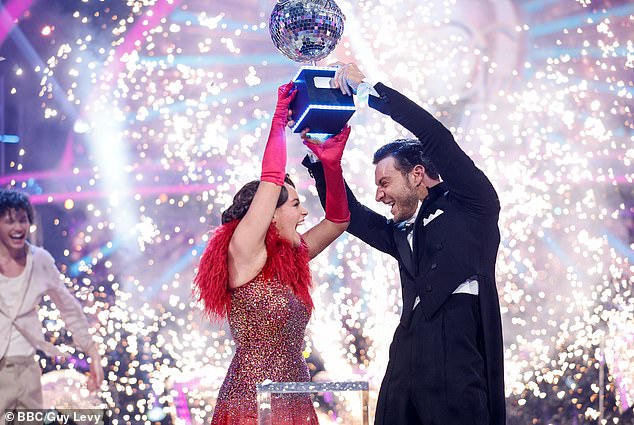 Ellie Leach, 22, and rumored boyfriend Vito Coppola, 31, lift the Glitterball on Saturday