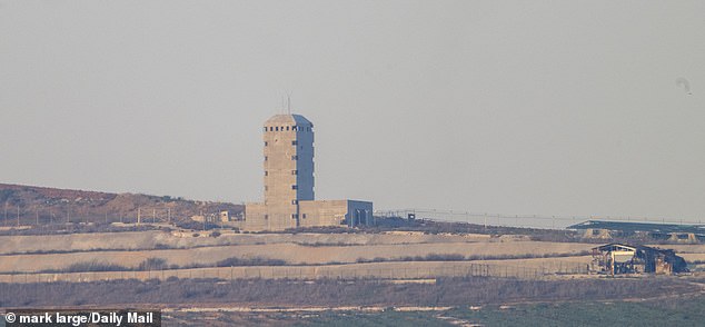 The enemy watchtower is barely half a mile away in Kfar Gil'adi