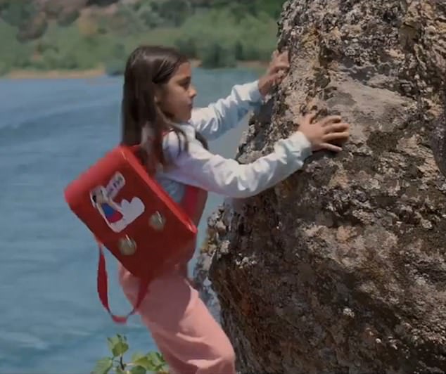 Memo, who is cognitively impaired, chases the young daughter of a military officer for a bag his daughter wants.  The little girl tragically falls off a cliff and dies