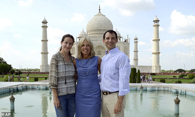 Jill Biden, center, poses in front of the Taj Mahal with her daughter Ashley Biden and son-in-law Howard David Kerin in Agra, India in 2013