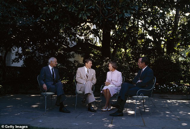 President Ronald Reagan (center left) speaks with newly appointed Supreme Court Justice Sandra Day O'Connor (center right) outside the White House Rose Garden in 1981. O'Connor was the first woman to serve on the Supreme Court