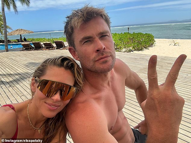 Taking to Instagram, the pair posted a gallery of cheerful holiday snaps showing themselves relaxing at the Tavarua Island Resort with their sons Tristan and Sasha, nine, and daughter India, 11.