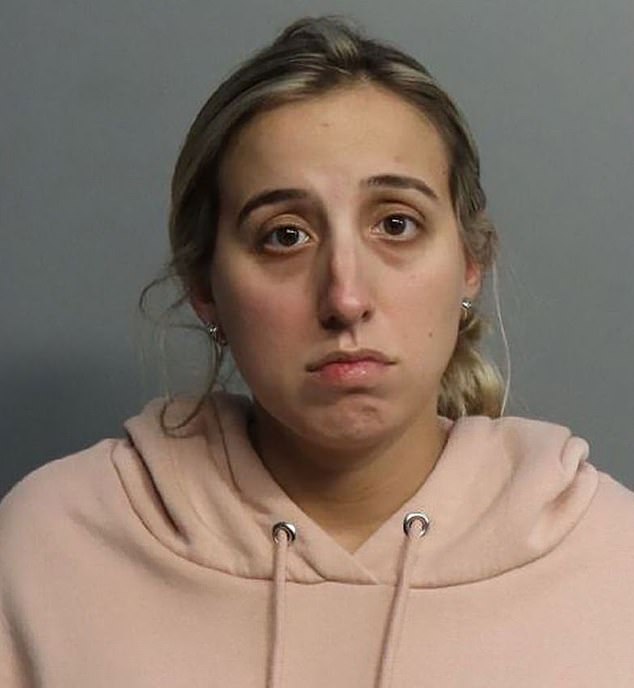 Lopez-Murray had sex with a 14-year-old former student in her car several times.  She is pictured during her arrest in October 2021