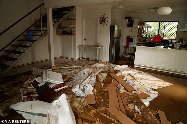 Pictured is flood damage to a house at Holloways Beach in Cairns