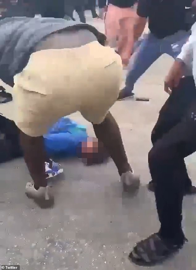 The video shows at least two assailants continuing to hit the victim even after he was knocked to the ground