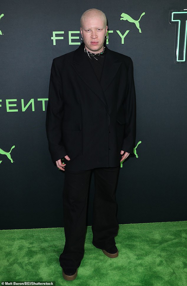 DJ extraordinaire Shaun Ross wore all black and rocked a pair of black Creepers