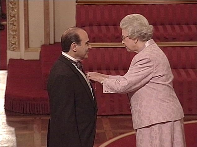 Sir David Suchet during an investiture ceremony with the Queen at Buckingham Palace in 2002