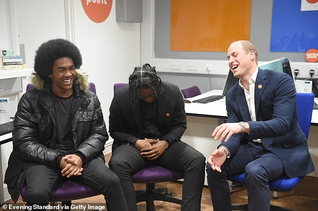 William laughs with PJ and Abdul, the Centrepoint homelessness charity in Northolt in 2017