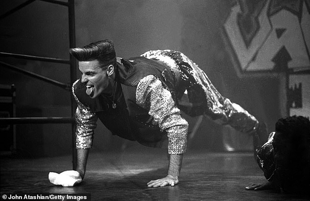 Rapper Robert Van Winkle, known professionally as Vanilla Ice, performs on stage during a performance "live" concert performance on March 15, 1991