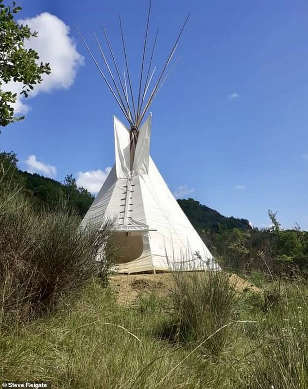 Tents, tepees and huts dot the rolling hills and horses, dogs and cats roam around whenever they please