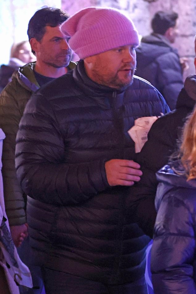 James appeared to have been treated to free tickets for the rides when he was seen holding one while queuing with his son