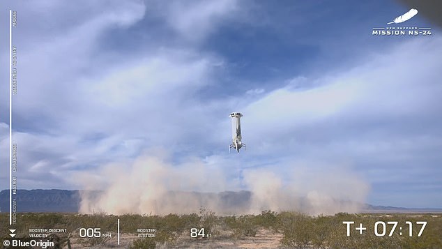 The booster made a soft landing in the desert at 11:53 a.m. ET