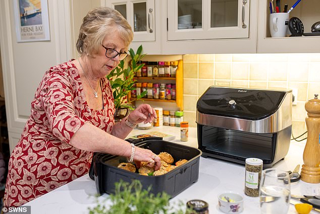 Beverley (pictured) first started cooking with an air fryer in May 2022 after her son bought one and the pair tried cooking frozen sausages and fries in the gadget