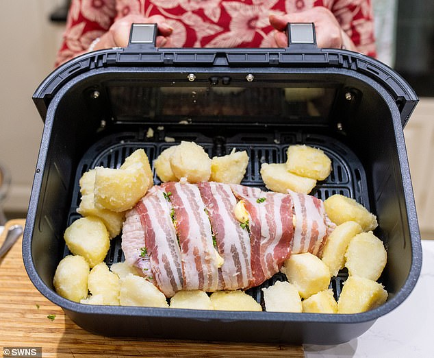 Beverley said: 'I'm so impressed with its efficiency, they can cook frozen food, reheat food, it can do fish, meat, vegetables and poultry - the range is incredible.'  Pictured is one of her meals before it was cooked