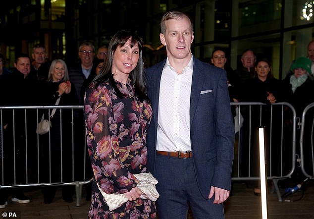 Andy, who proposed to Beth in 2016, looked dapper in a smart suit that he teamed with a white shirt