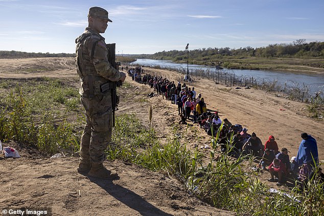 Migrants are queuing at the border to be processed as new figures show around 2,000 migrants are crossing every day - with a new single-day record of 12,600 apprehensions on Monday