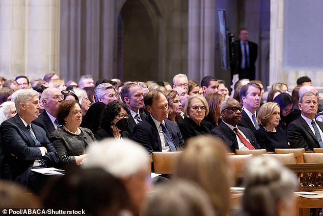 Chief Justice John Roberts is seen with his wife Jane Sullivan (far right) at the funeral of Justice Sandra Day O'Connor with (from left) Neil Gorsuch, Elena Kagan, Sonia Sotomayor, Samuel Alito, Ginni Thomas, wife of Clarence Thomas