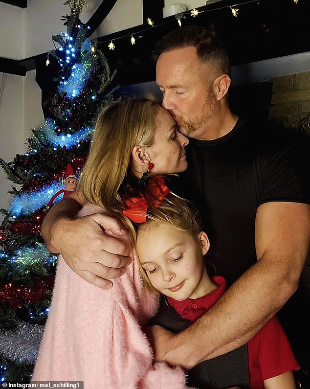 Married At First Sight expert Mel, who appears on the British and Australian versions of the show, revealed she has been diagnosed with bowel cancer.  She is pictured with her husband Gareth Brisbane and daughter Madison