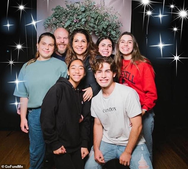 The 20-year-old (pictured below right with his parents and sisters) died of a suspected heart attack on the field in suburban Melbourne on December 15.